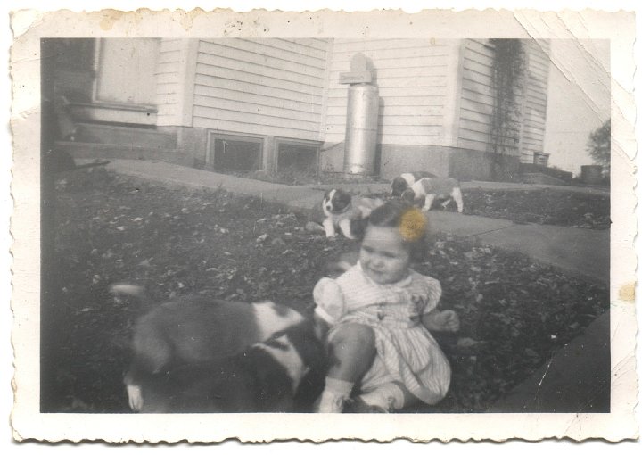 0165.jpg - Rozella Beachy with puppies.  1949c