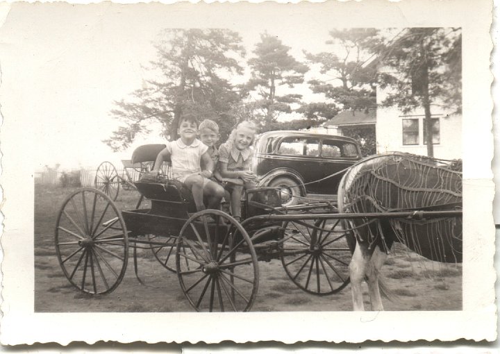 0340.jpg - Gary Reschly, Howard King, Margaret Sandeen  1942c  Edna worked at Sandeen's.