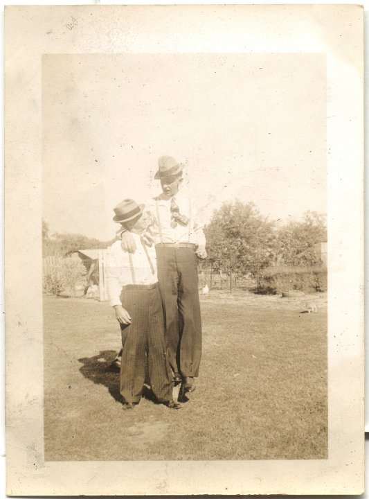 0455.jpg - "Mutt & Jeff"--Harold Bontrager & Oliver on stilts.  Trip to Texas  1940-41