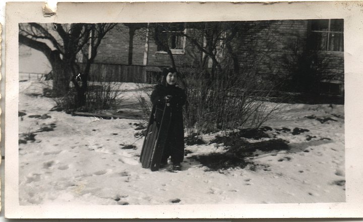 0648.jpg - Robert Kauffman with sled.  1944c