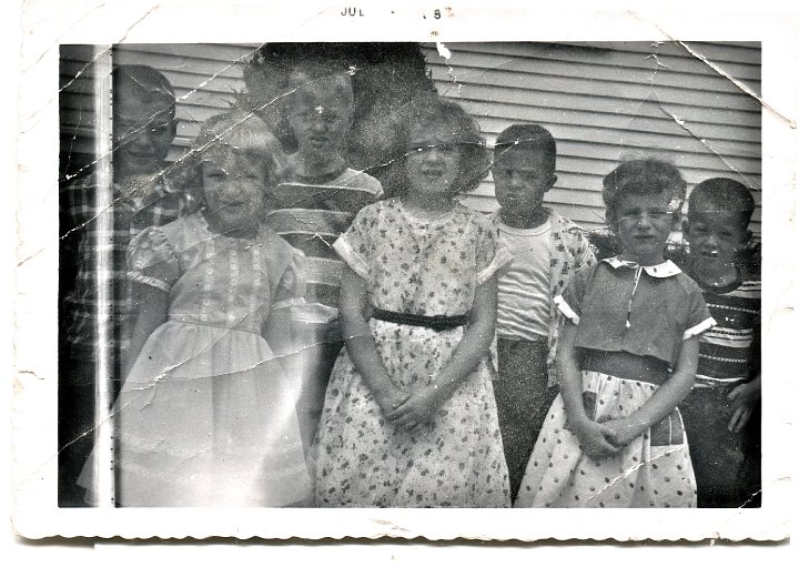 0701.jpg - Bible school:  Back row:  Lynn Roth, Larry Richard, ???, Rodney Reschly; front row:  Marla Wyse, Beth Roth, ???.  1958c