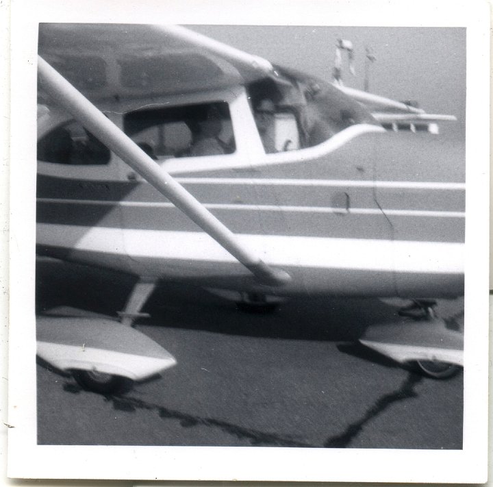 0757.jpg - 2 men in a plane.  unknown  1958c