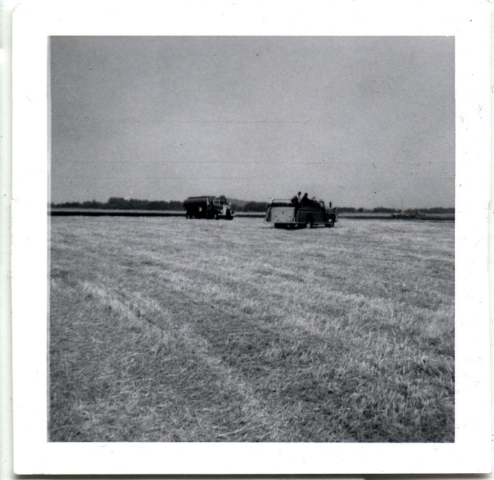 0771.jpg - firetrucks in a field.  1957c