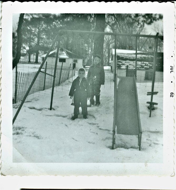 0960.jpg - Lamar Roth & ??? play on the swings.  1962