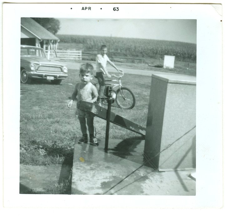 0965.jpg - Lynn Roth on bike, son of Wayne King.  1963