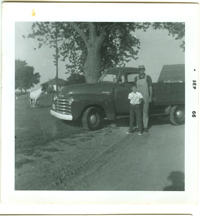 0985.jpg - Lamar & Ray Roth, International truck.  1966.  Soon traded up for a newer truck