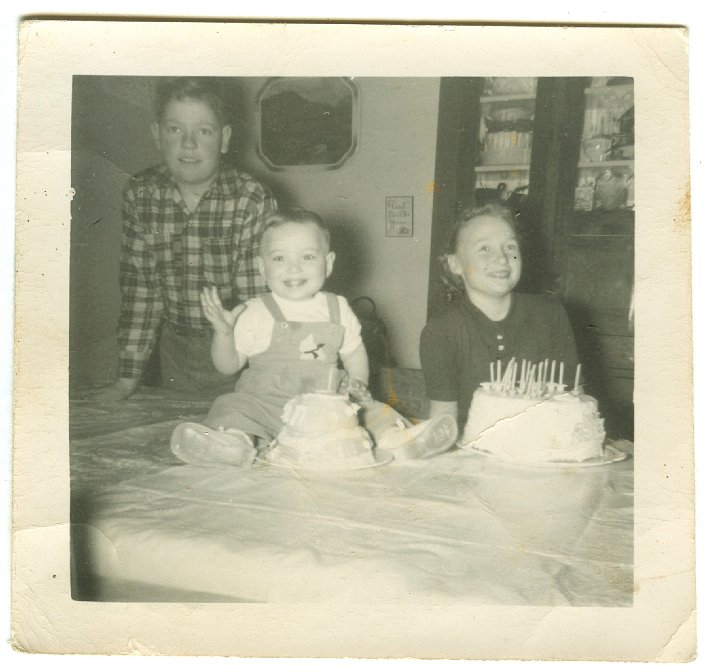 1065.jpg - Bob Yoder, Lynn Roth, Janet Yoder.  Birthdays  1952