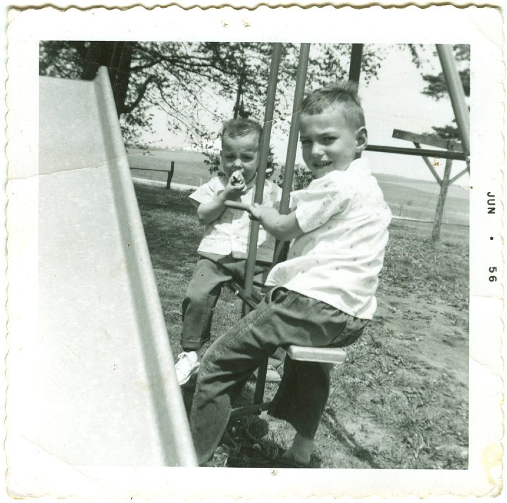 1122.jpg - Reynolds & Lynn Roth on swing.  1956