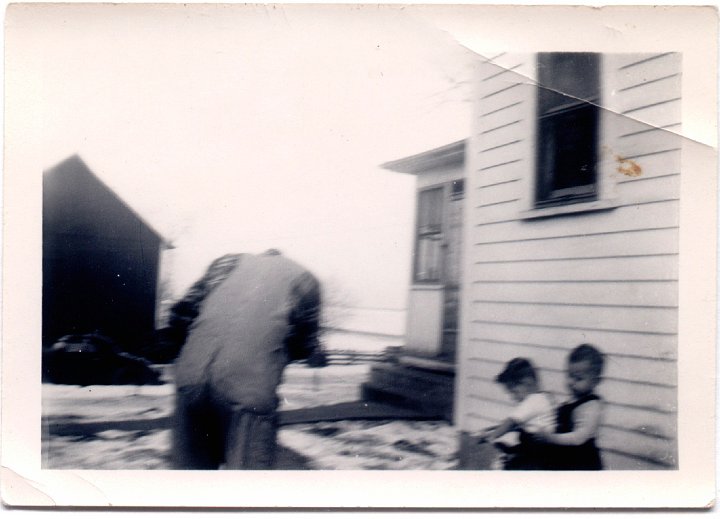 1534.jpg - Ray, Larry ?, & Fred Roth behind the house.  1950c