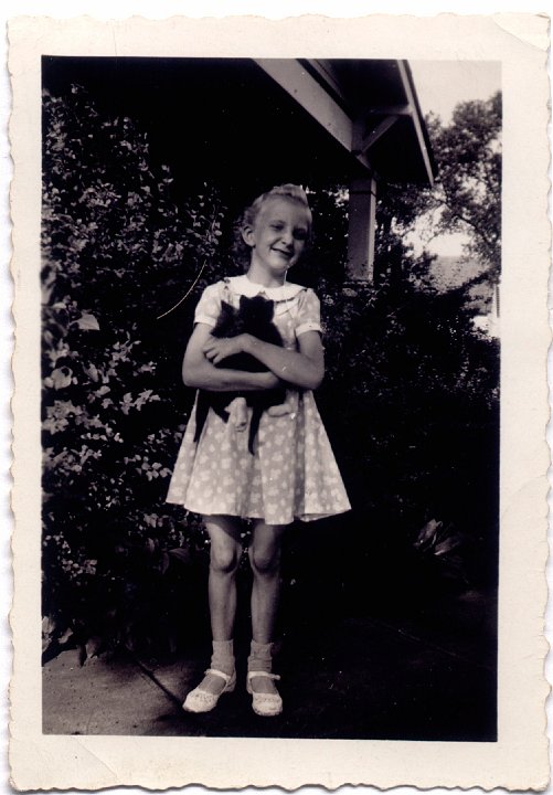 1561.jpg - Margaret Sandeen holding kittens.  1943c