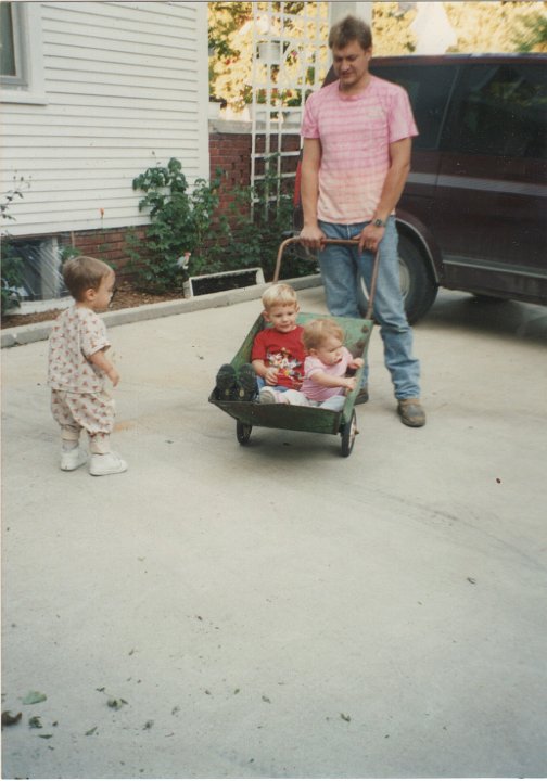 1854.jpg - Eric Gerst, Brayden, Baylee, Kevin Roth.  1994