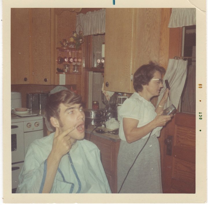 1948.jpg - Lynn getting a hair cut on the farm.