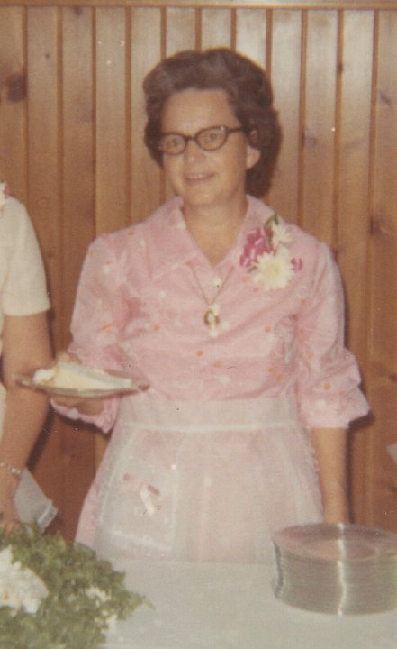 2030.jpg - Edna Roth serving cake.