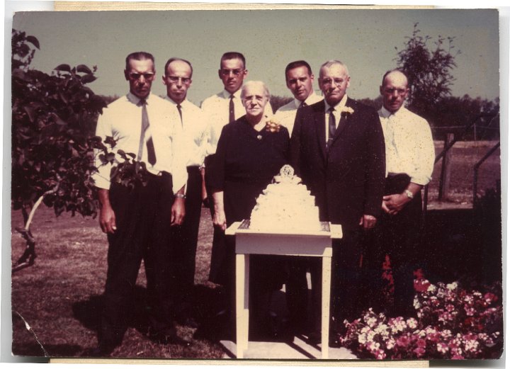 0147.jpg - Dan & Lizzie Gerig Roth and boys.  60th Wedding Anniversary.  Left:  Lloyd, Orie, Wilmer, Ivan, and Glen.   1965  Lizzie is a sister to Fannie Gerig Roth.  Picture taken by Fred Roth.  Lizzie and Dan passed away within 2 yrs of this picture.