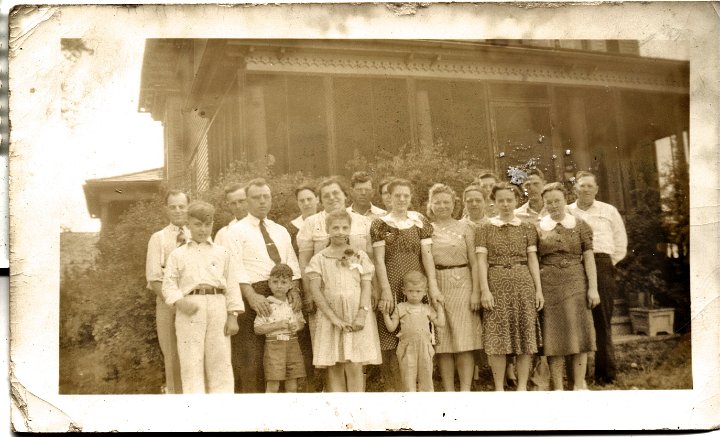 0284.jpg - William Reschly Family.  Young adults and spouses.  1944c  back left:  Harold Reschly, Vernon & Ruth Kaufman,  Floyd, Hazel, Millie O, Ralph, William Reschly.  front left: Howard, Ralph, Betty King, Irene Pankoke, Lollabelle, Katie Reschly, Edna Roth, Irene Reschly.   Front:  Wayne & Ethel King, Gary Reschly.