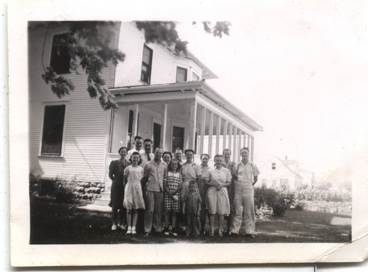 0642.jpg - Group photo.  Willie & Katie Reschly, back center; Harold, Edna, Irene Reschly, front center; Irene I & Gary Reschly, front right.  George & Alta Gingerich, back right; Harold & Geneva, Treva, Lola Von  Bontrager 1942c