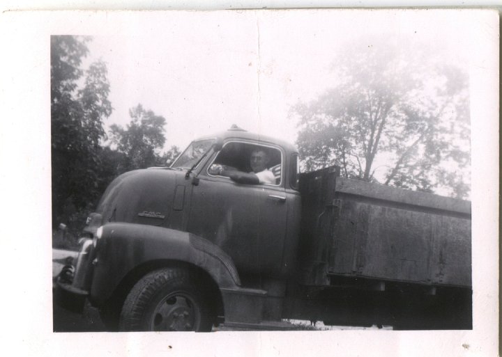 0390.jpg - Ray Roth in big GMC truck.  1945c