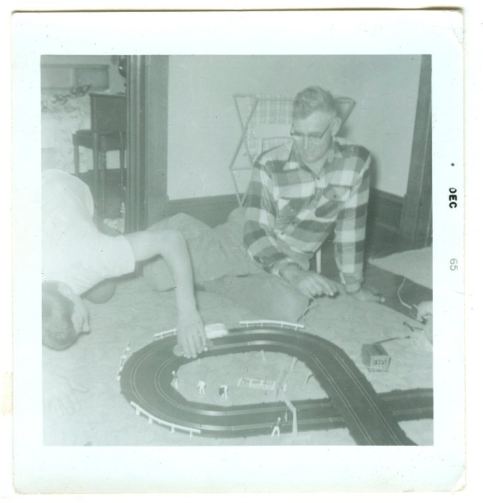 1179.jpg - Ray & Reynolds Roth with car racetrack.  1965