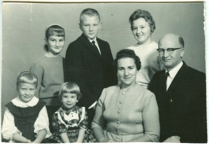 1319.jpg - The Daniel & Grace Widmer Family of Salem, OR  1963c.  From Right:  Daniel, Judy, Grace sitting, Gaylord, Ellen standing, ??? & ??? sitting Widmer.  Daniel is a cousin of Ray Roth, a child [grandchild?] of an older half-sibling of Joseph J. Roth.