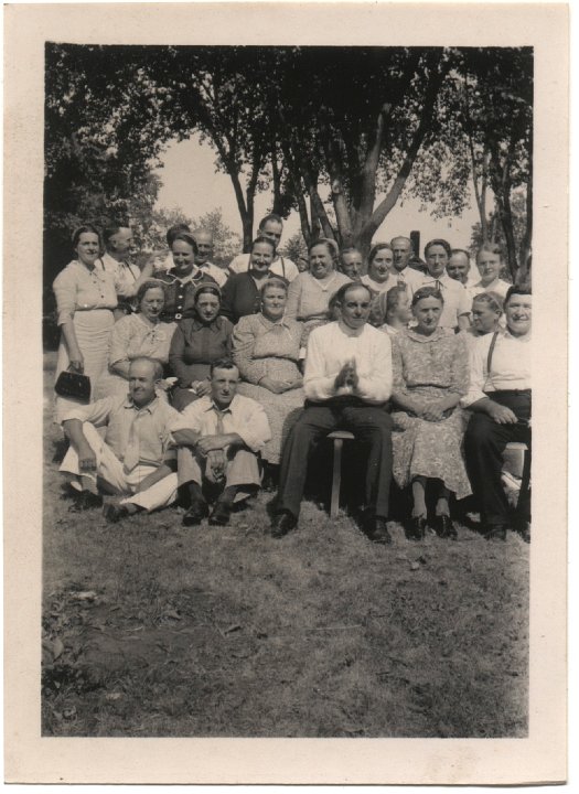 0020.jpg - Abraham Swartzendruber Reunion 2   1952c.  Katie Swartzendruber 2nd row from front, 2nd from left; dark dress.