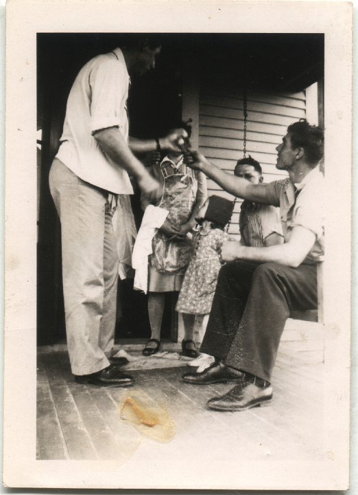 0272.jpg - Elgin Pankoke, Ralph & Irene Reschly, ??? Child, Ray standing in forefront.  1947c