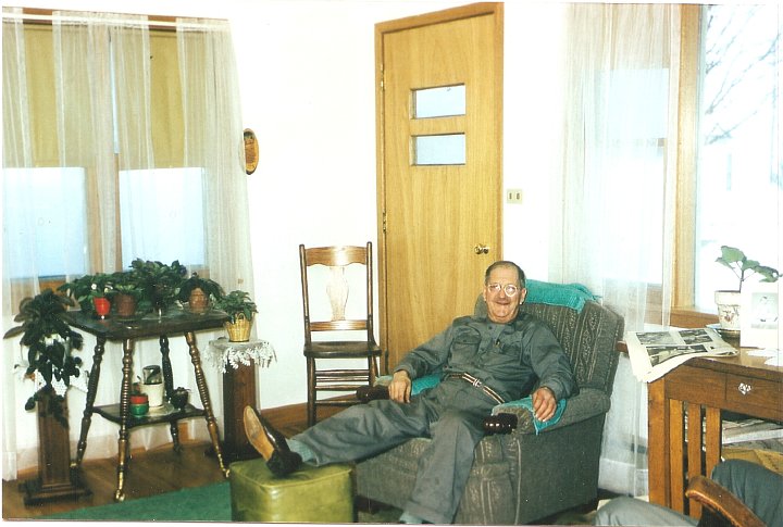 1388.jpg - William Reschly in his house in Olds right after the house was built.