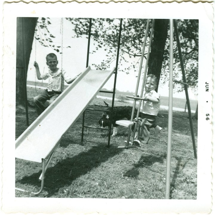 1043.jpg - Lynn & Reynolds Roth on swingset.  1956