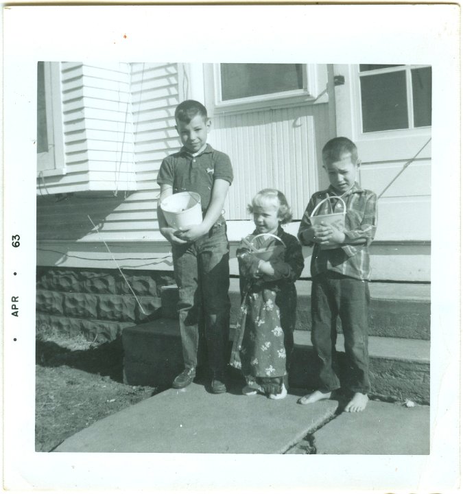 1126.jpg - Reynolds Roth, Julie Ogie, Lamar Roth Easter morning baskets.  1963