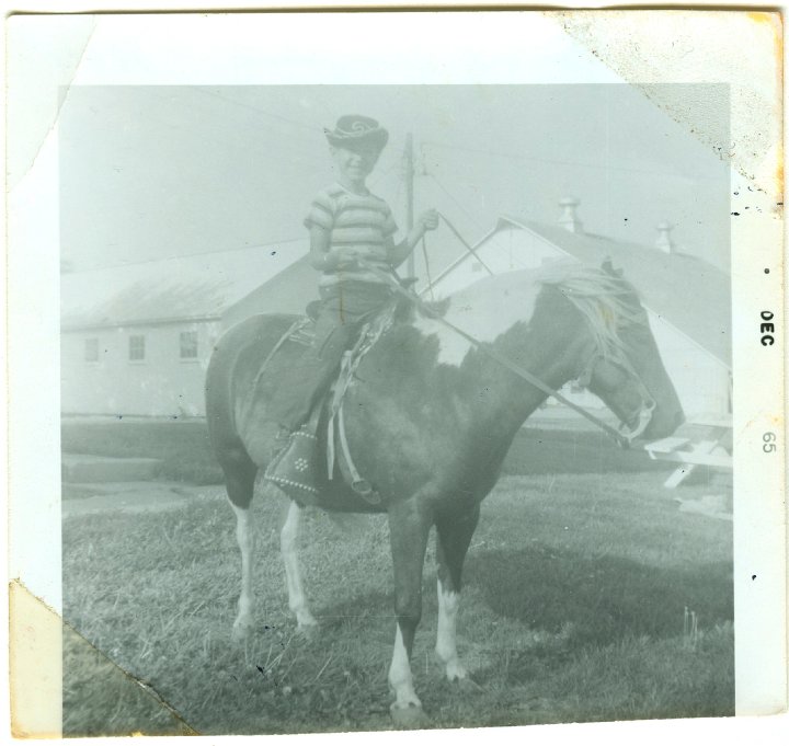 1142.jpg - Lamar Roth on Rocket.  'Going camping'  1965