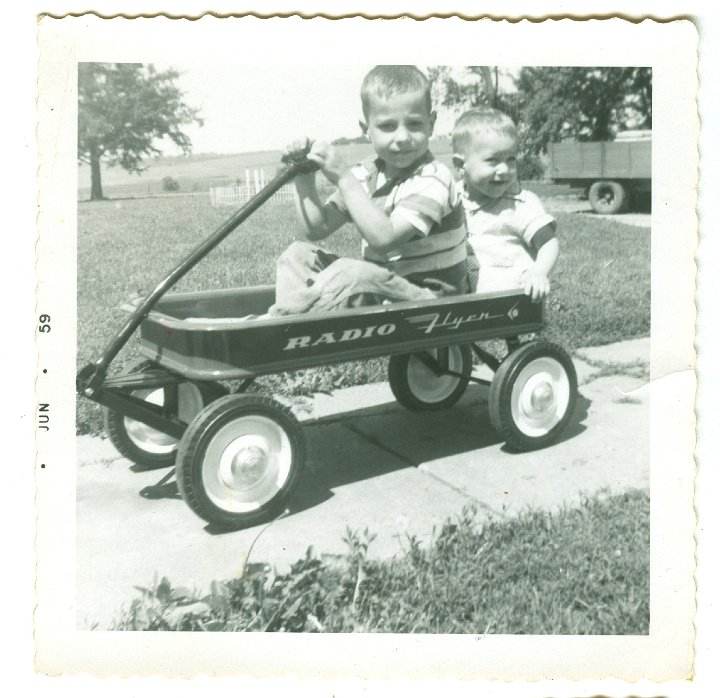 1172.jpg - Reynolds & Lamar Roth in wagon.  1959