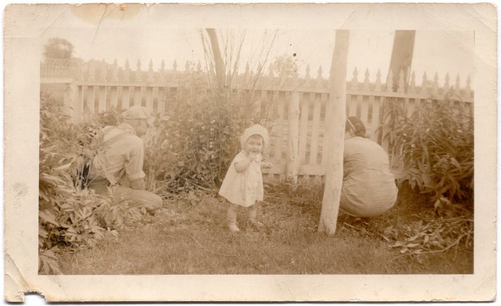 1549.jpg - Ray & Edna Roth in garden with unknown girl.  1946c